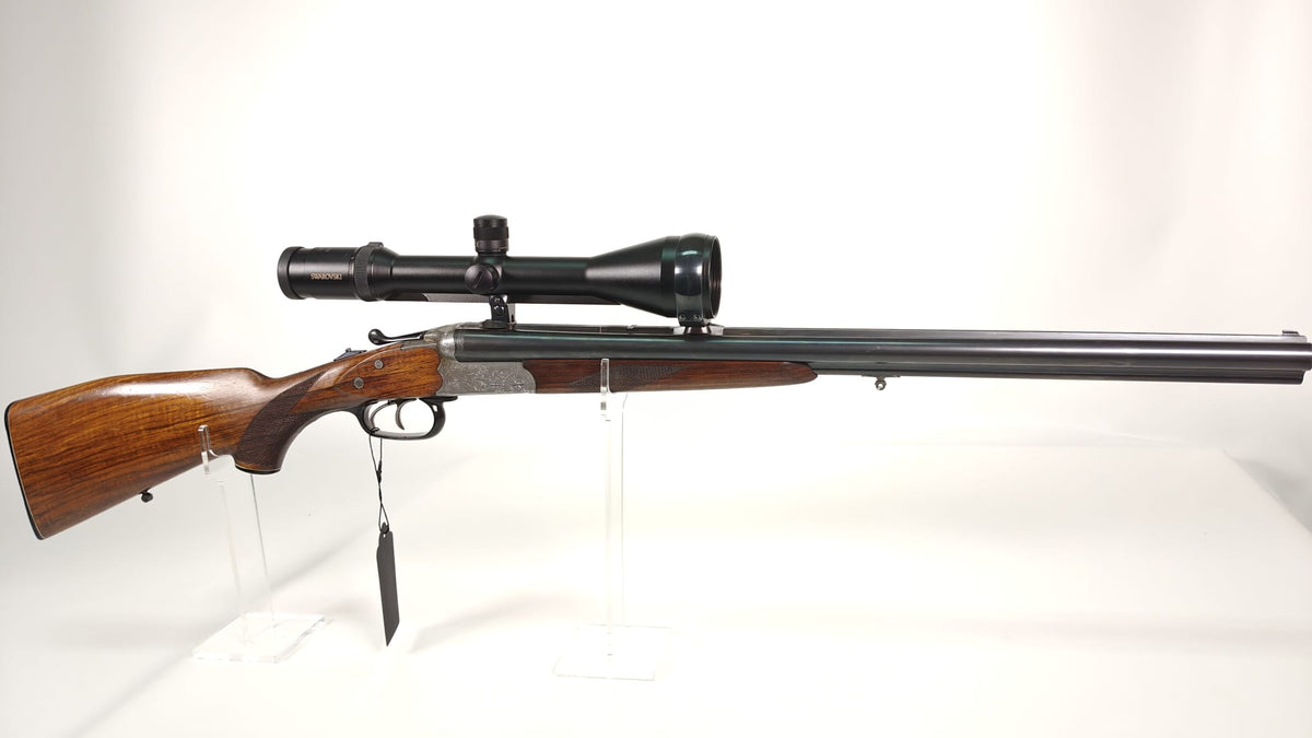 Sauer & Sohn Drilling 7x57 R / 16/70 mit Einstecklauf .22 Hornet und Swarovski Habicht 2,5–10x56
