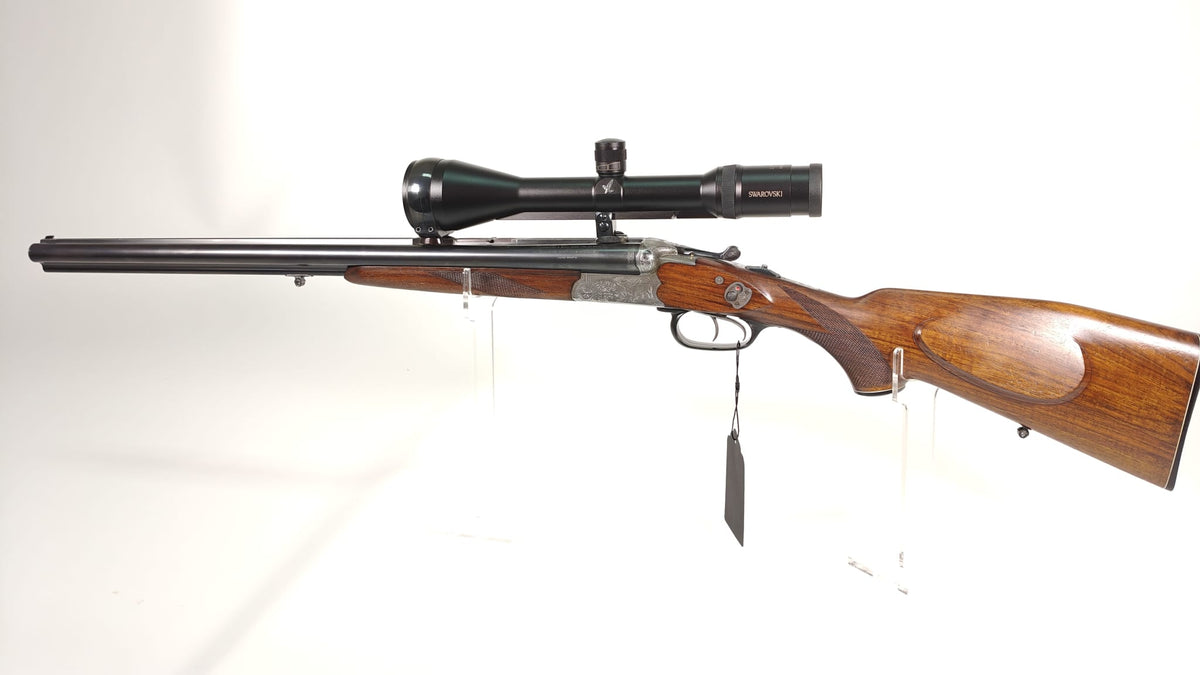 Sauer & Sohn Drilling 7x57 R / 16/70 mit Einstecklauf .22 Hornet und Swarovski Habicht 2,5–10x56