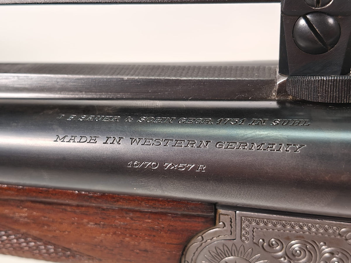 Sauer & Sohn Drilling 7x57 R / 16/70 mit Einstecklauf .22 Hornet und Swarovski Habicht 2,5–10x56