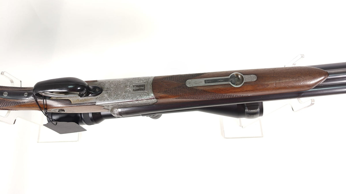 Sauer & Sohn Drilling 7x57 R / 16/70 mit Einstecklauf .22 Hornet und Swarovski Habicht 2,5–10x56