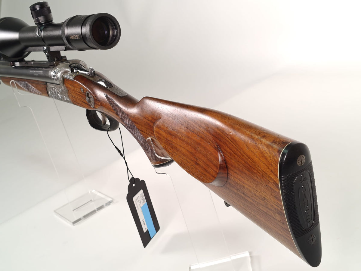 Sauer & Sohn Drilling 7x57 R / 16/70 mit Einstecklauf .22 Hornet und Swarovski Habicht 2,5–10x56